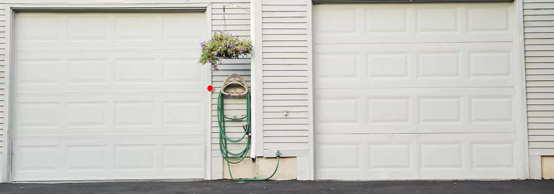 Sectional Garage Door Dropped Down Repair in Toronto, Ontario