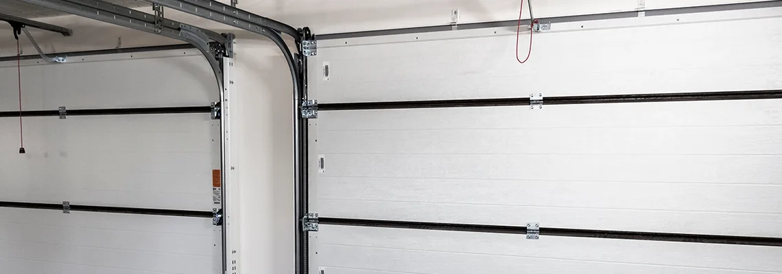 Fix Folding Garage Door Jerking in Toronto, Ontario