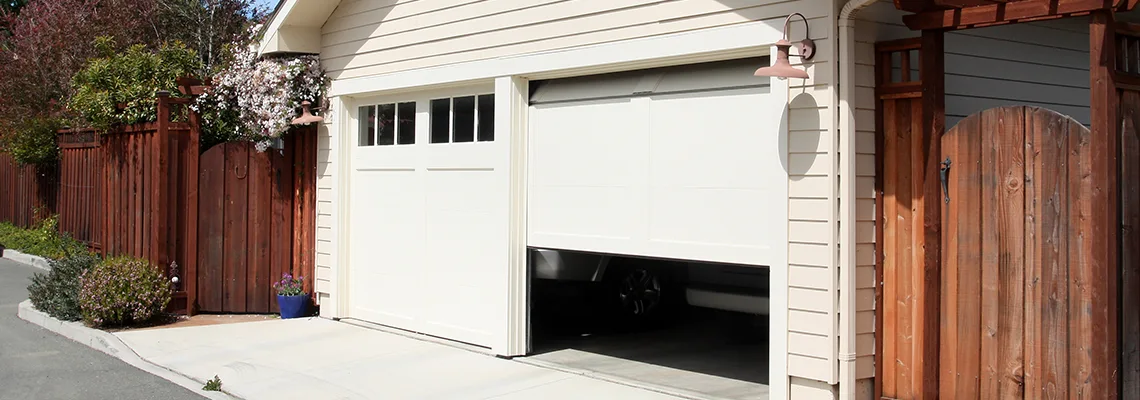 Fix Metal Garage Door Jerking in Toronto, Ontario